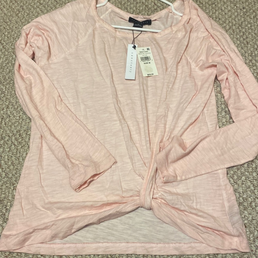 New with tags. Sanctuary long sleeve, color is a light pink.